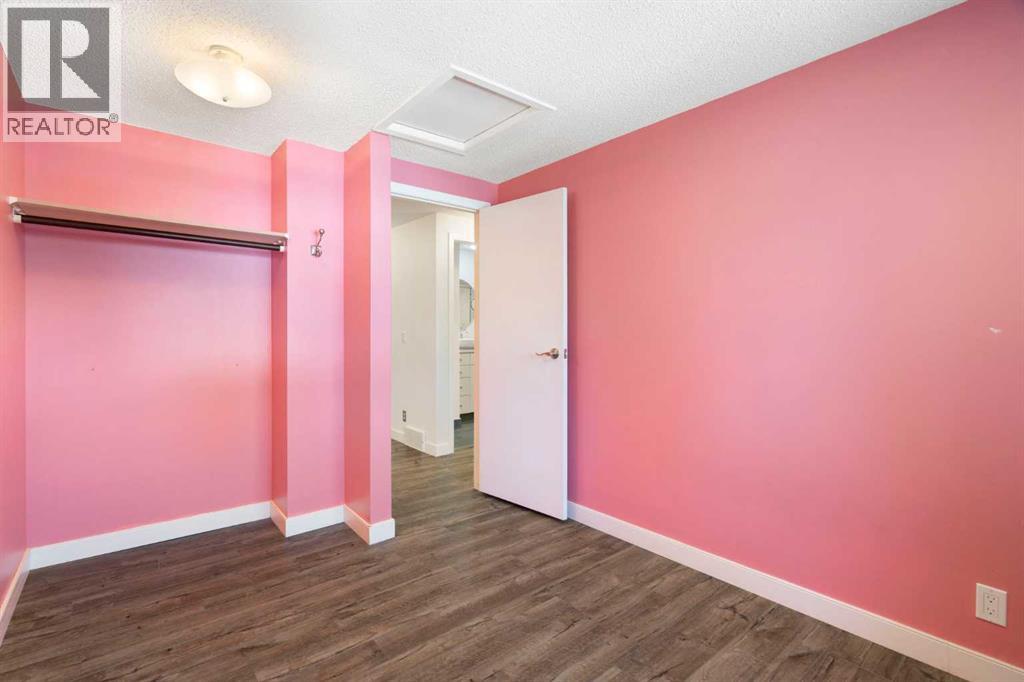 191 Woodmont Terrace SW, Calgary, Alberta  T2W 3K3 - Photo 19 - A2321912