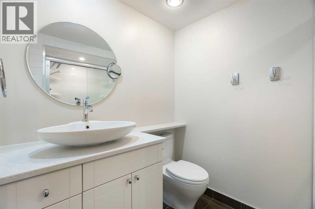 191 Woodmont Terrace SW, Calgary, Alberta  T2W 3K3 - Photo 22 - A2321912