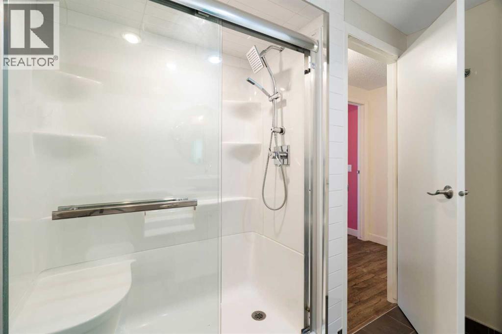 191 Woodmont Terrace SW, Calgary, Alberta  T2W 3K3 - Photo 23 - A2321912