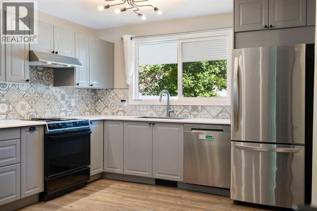 191 Woodmont Terrace SW, Calgary, Alberta  T2W 3K3 - Photo 10 - A2321912