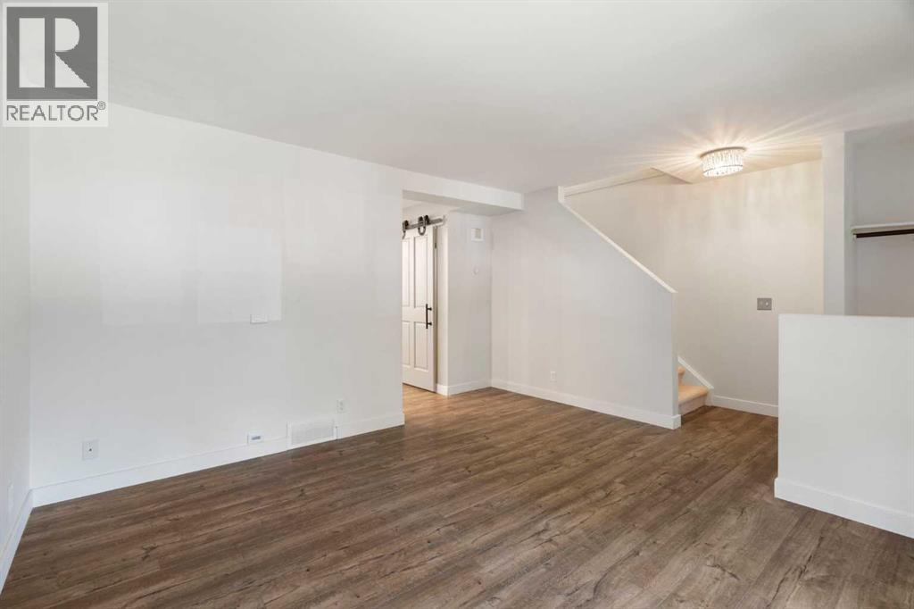 191 Woodmont Terrace SW, Calgary, Alberta  T2W 3K3 - Photo 6 - A2321912
