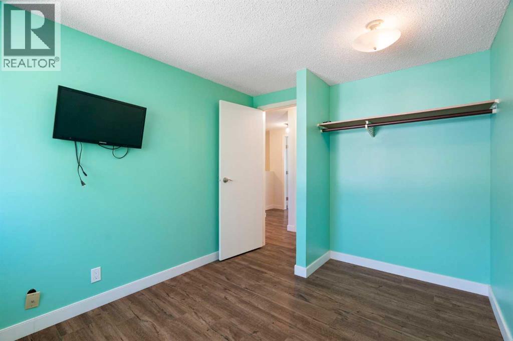 191 Woodmont Terrace SW, Calgary, Alberta  T2W 3K3 - Photo 21 - A2321912