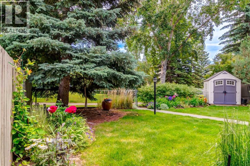 367 Woodbriar Circle SW, Calgary, Alberta  T2W 6A4 - Photo 3 - A2328159