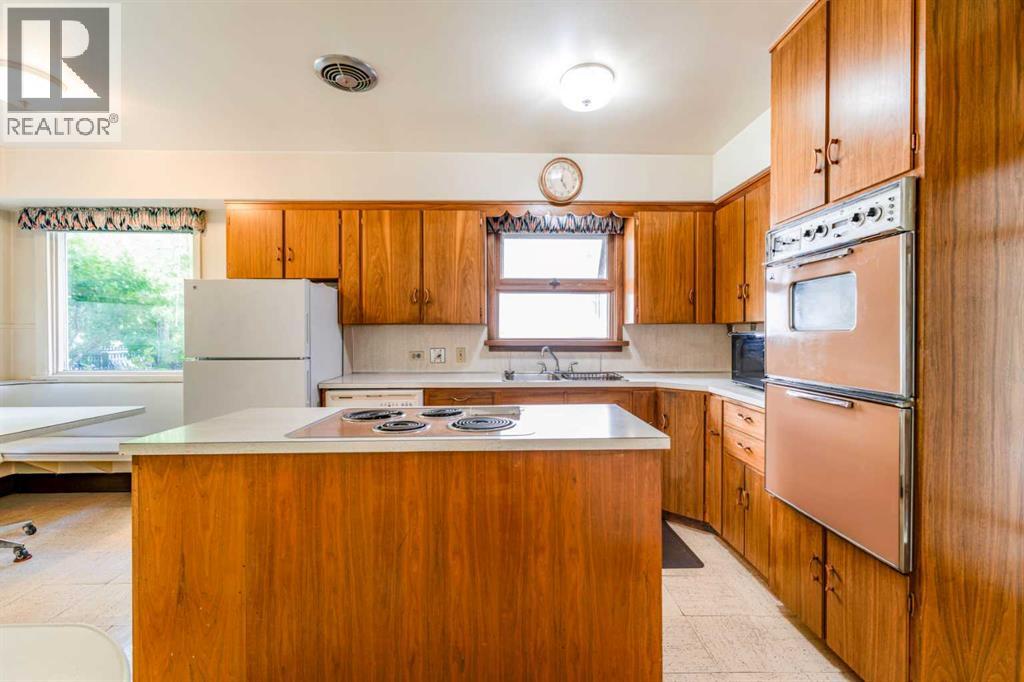 1122 9 Street NW, Calgary, Alberta  T2M 3K8 - Photo 6 - A2326988