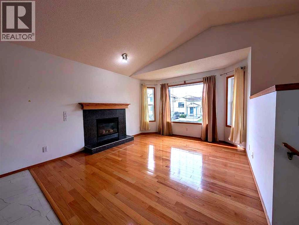 151 Taracove Estate Drive NE, Calgary, Alberta  T3J 4R1 - Photo 4 - A2325112