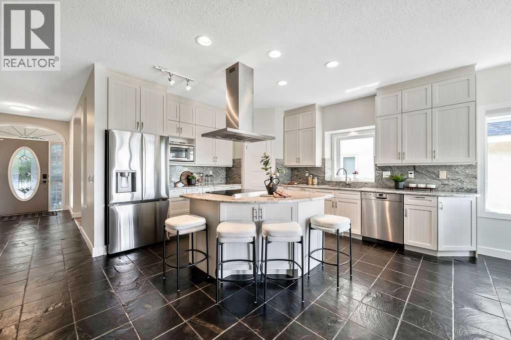 410 Mt Sparrowhawk Place SE, Calgary, Alberta  T2Z 2G9 - Photo 4 - A2327662