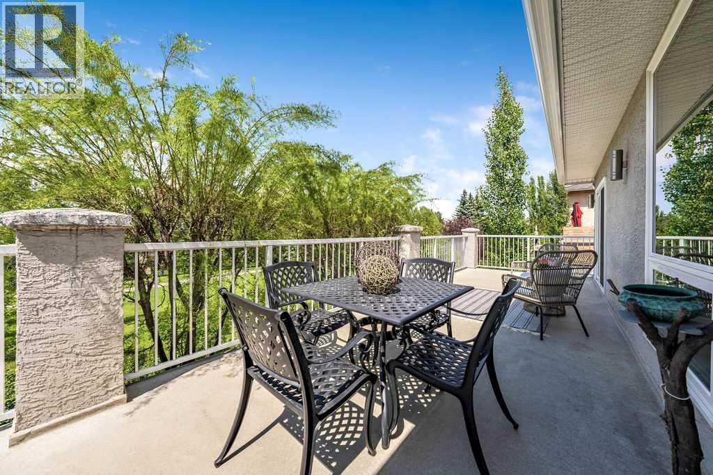 410 Mt Sparrowhawk Place SE, Calgary, Alberta  T2Z 2G9 - Photo 8 - A2327662