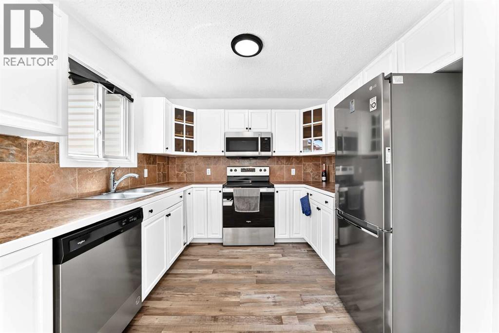 3728 Cedarille Drive Sw, Calgary, Alberta  T2W 3Z8 - Photo 4 - A2326804