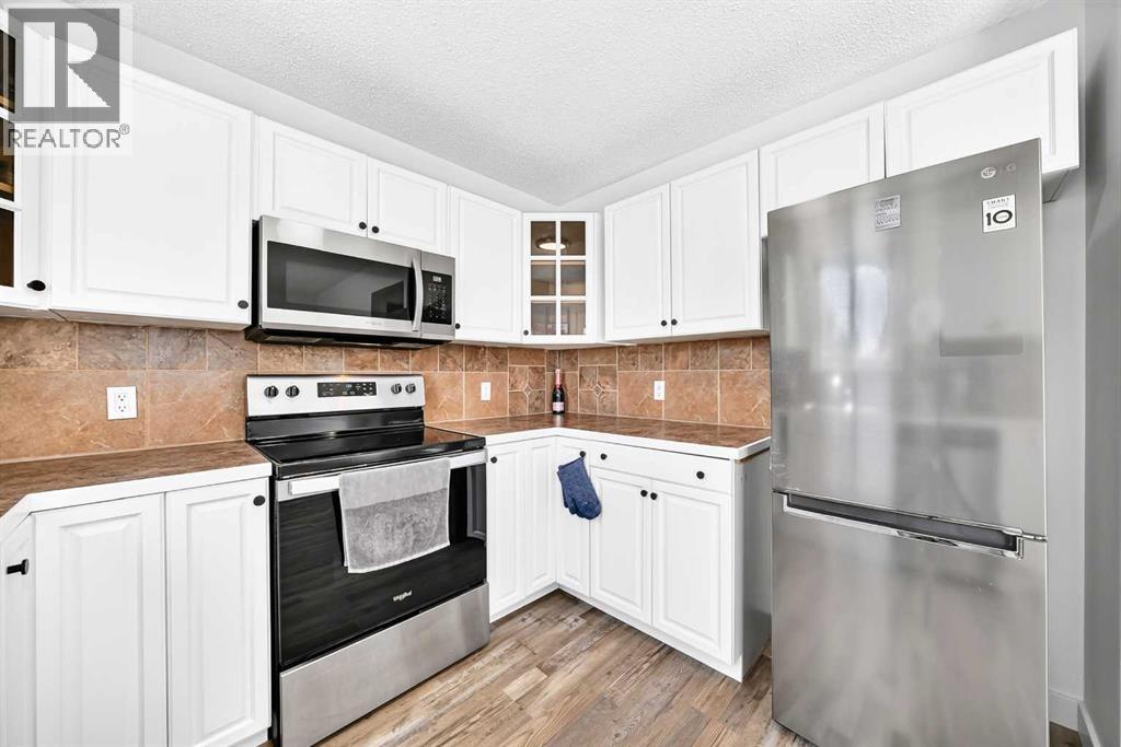 3728 Cedarille Drive Sw, Calgary, Alberta  T2W 3Z8 - Photo 7 - A2326804