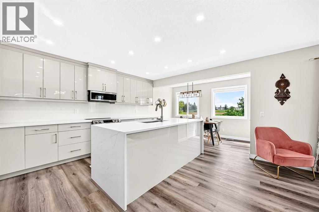 7230 Laguna Way NE, Calgary, Alberta  T1Y 7B9 - Photo 6 - A2325299