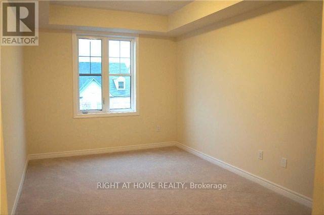 302 - 263 Georgian Drive, Oakville, Ontario  L6H 6V1 - Photo 3 - W13239330