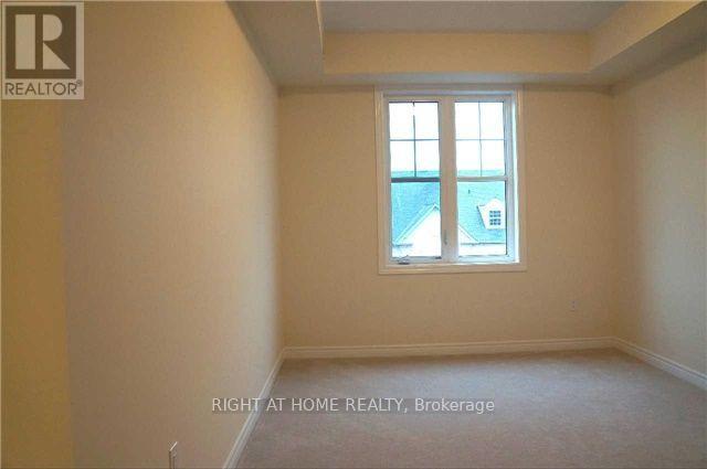 302 - 263 Georgian Drive, Oakville, Ontario  L6H 6V1 - Photo 4 - W13239330