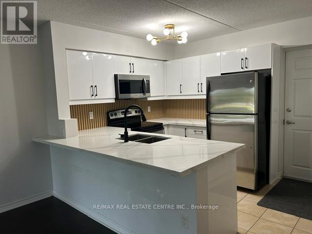 103 - 1370 Main Street E, Milton, Ontario L9T 7S8 - Photo 3 - W13535364