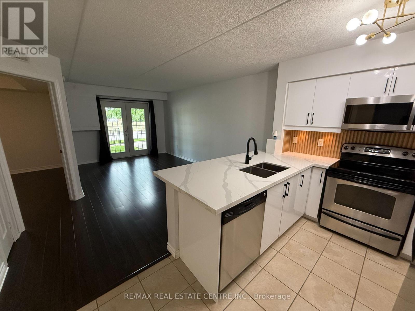 103 - 1370 Main Street E, Milton, Ontario L9T 7S8 - Photo 4 - W13535364