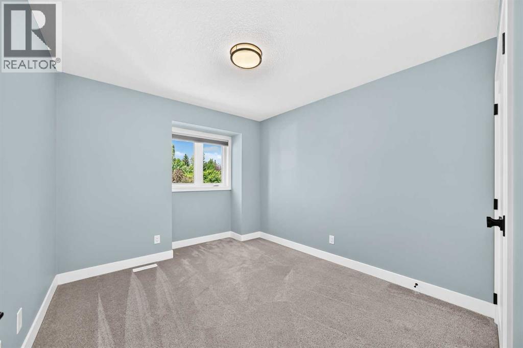 123 Wood Valley Drive Sw, Calgary, Alberta  T2W 5V6 - Photo 29 - A2328675