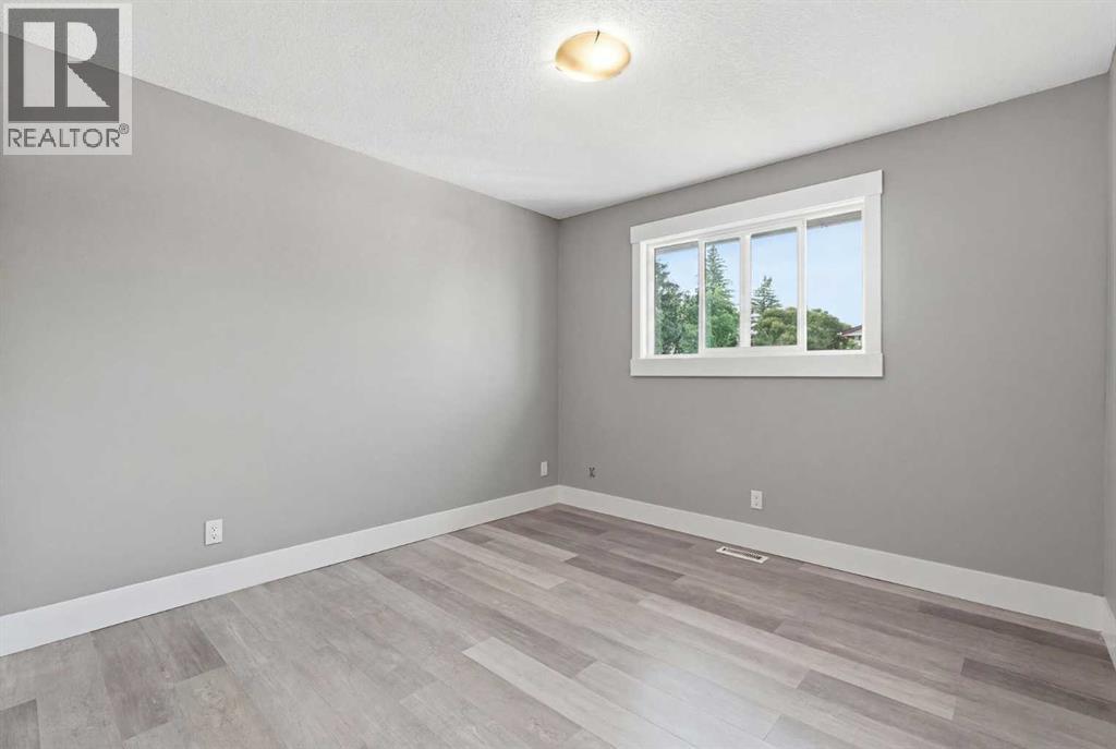 99 Pinecliff Close, Calgary, Alberta  T1Y 4N4 - Photo 10 - A2329433