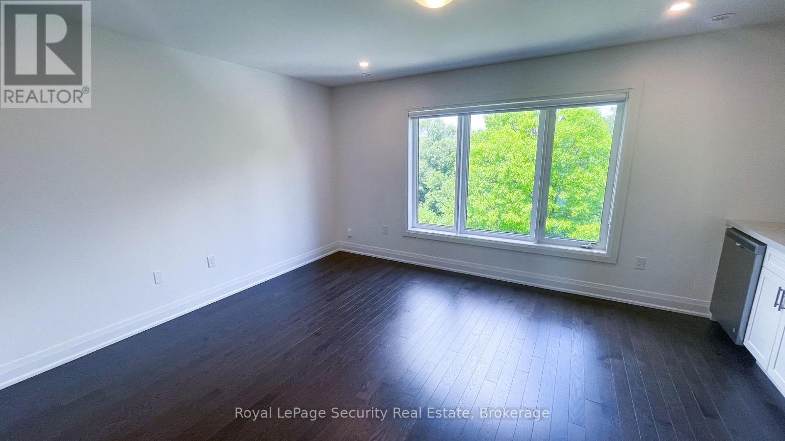Unit 2 - 39 Wild Rose Gardens, Toronto, Ontario M6L 0A5 - Photo 7 - W13566096