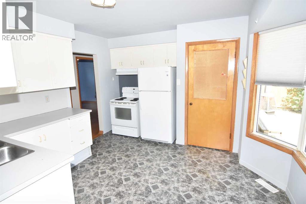 36 Cheyenne Crescent NW, Calgary, Alberta  T2L 0Z2 - Photo 8 - A2328848