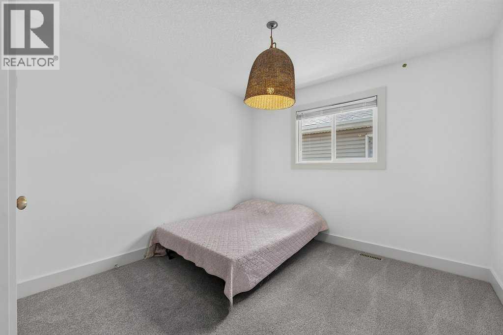 232 Copperpond Circle SE, Calgary, Alberta  T2Z 0R3 - Photo 21 - A2327549