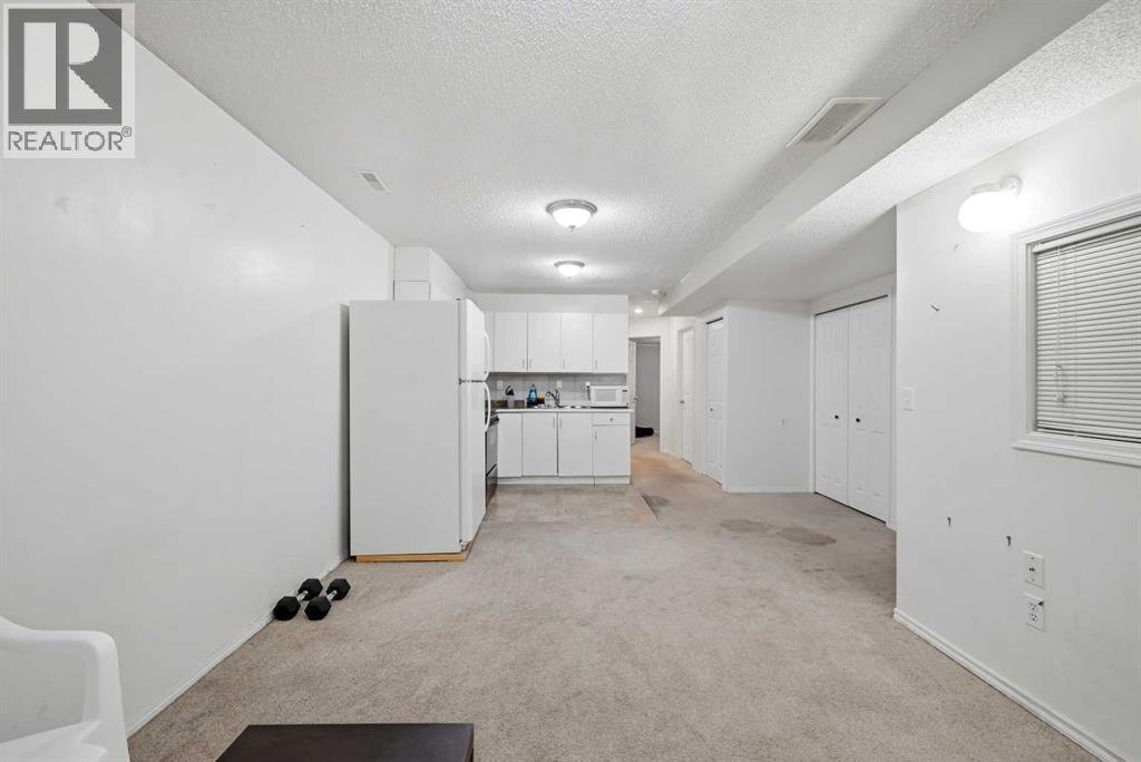 33 Saddlecrest Close NE, Calgary, Alberta  T3J 5B5 - Photo 32 - A2327223
