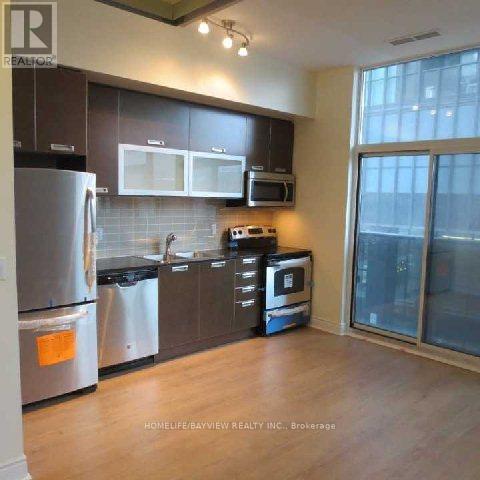 # 201 - 28 Ted Rogers Way, Toronto, Ontario  M4Y 2J4 - Photo 2 - C13570022