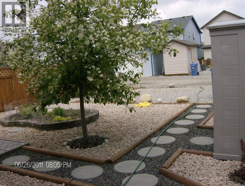 55 Eversyde Green SW, Calgary, Alberta  T2Y 5C7 - Photo 3 - A2328396