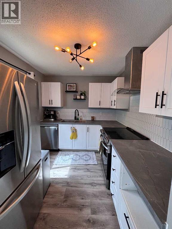 111 Columbia Place W, Lethbridge, Alberta  T1k 5A8 - Photo 4 - A2319539