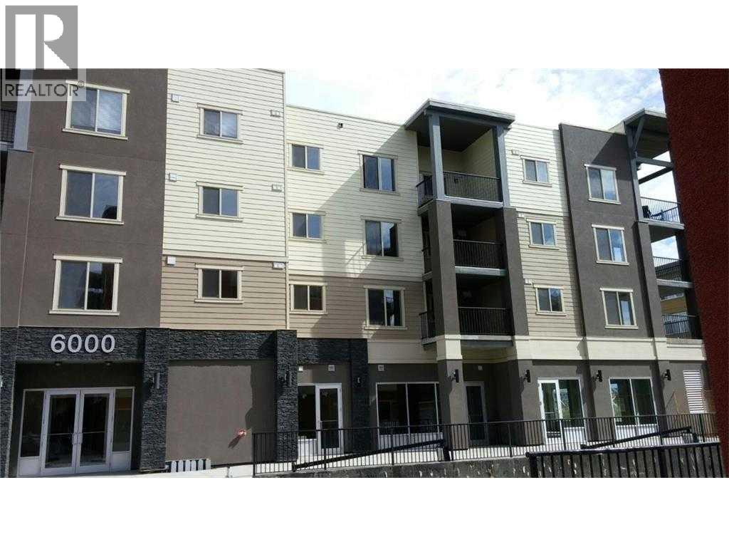 6210, 403 Mackenzie Way SW, Airdrie, Alberta T4B 3V7 - Photo 2 - A2329371