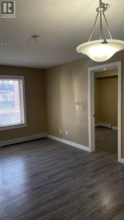 6210, 403 Mackenzie Way SW, Airdrie, Alberta T4B 3V7 - Photo 12 - A2329371