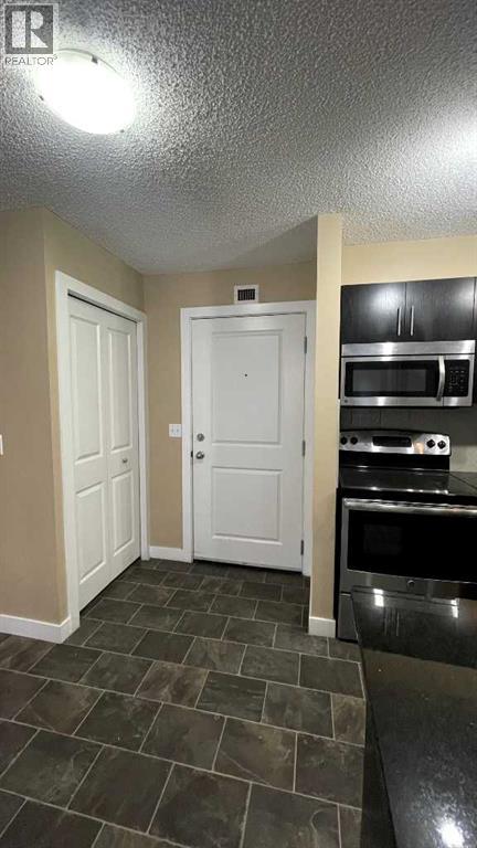 6210, 403 Mackenzie Way SW, Airdrie, Alberta T4B 3V7 - Photo 10 - A2329371