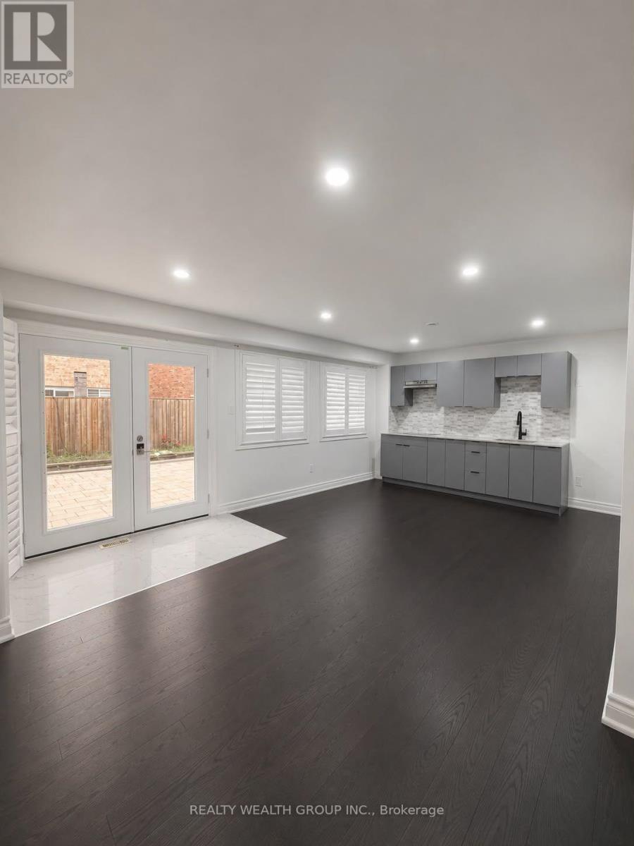 GROUND - 13 BRIDER CRESCENT