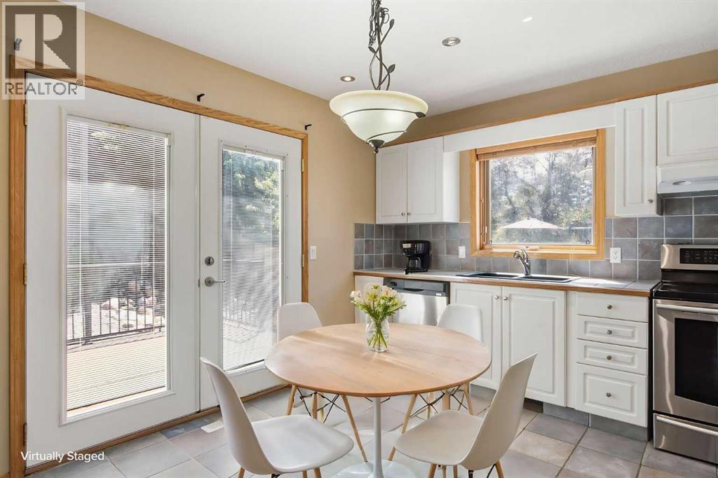 144 Douglas Ridge Close SE, Calgary, Alberta  T2Z 2P6 - Photo 8 - A2326399