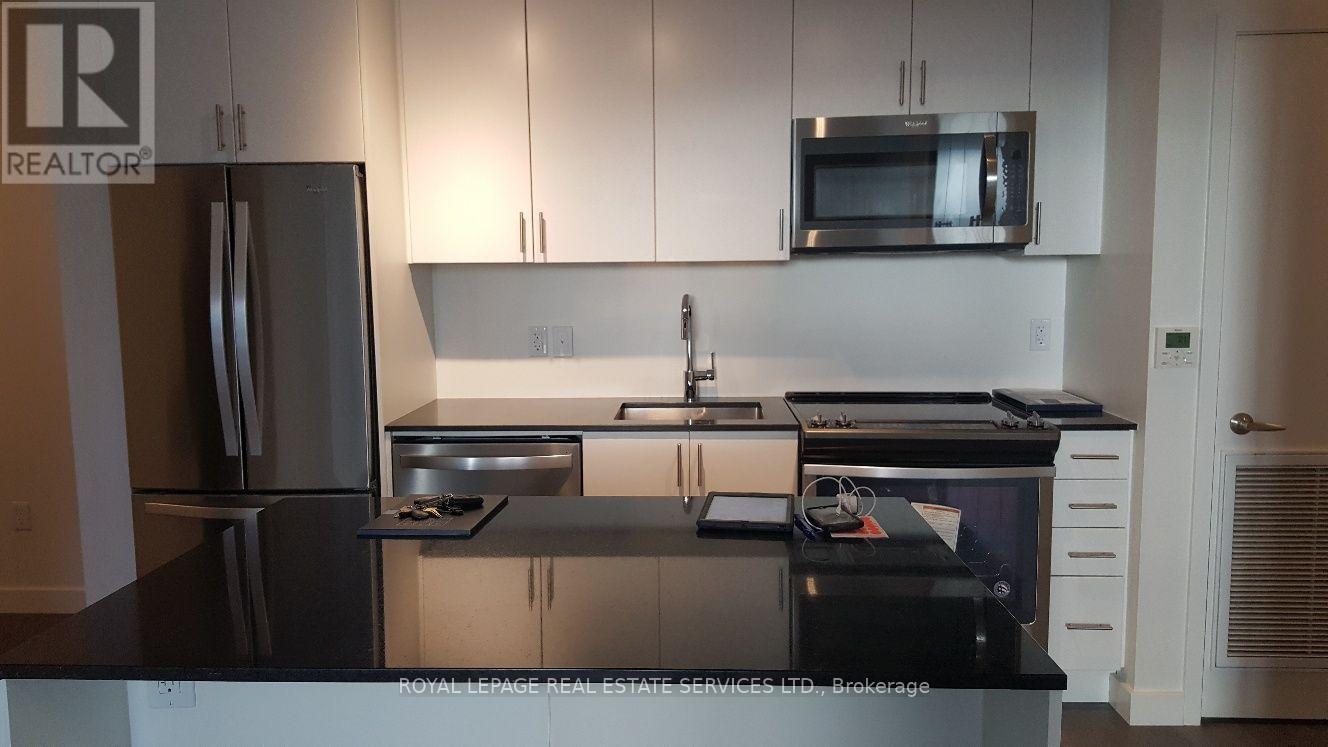 319 - 168 Sabina Drive, Oakville, Ontario  L6H 7C3 - Photo 2 - W13578356