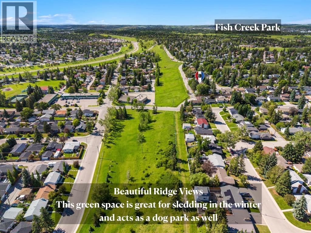 1102 Lake Christina Way SE, Calgary, Alberta  T2J 2R3 - Photo 3 - A2323564