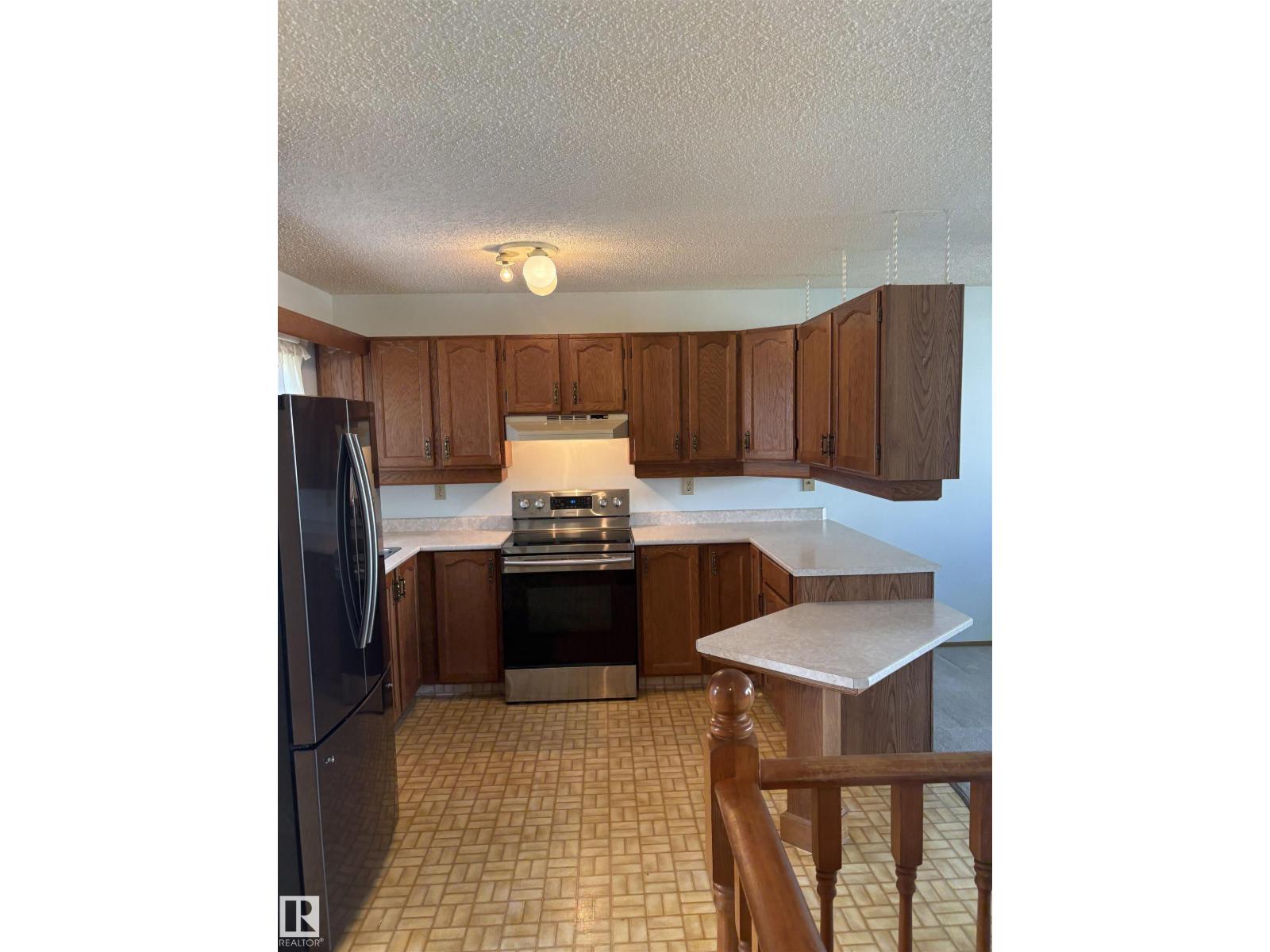 17520 Callingwood Rd NW NW, Edmonton, Alberta  T5T 5P1 - Photo 9 - E4499676