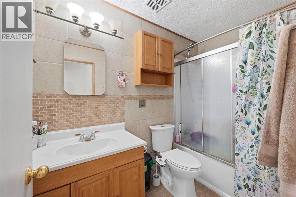 4 Fallswater Road NE, Calgary, Alberta  T3J 1B1 - Photo 21 - A2329294