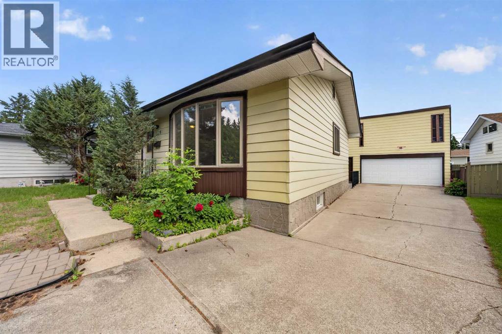 135 Huntcroft Way Ne, Calgary, Alberta  T2K 4E4 - Photo 11 - A2329692