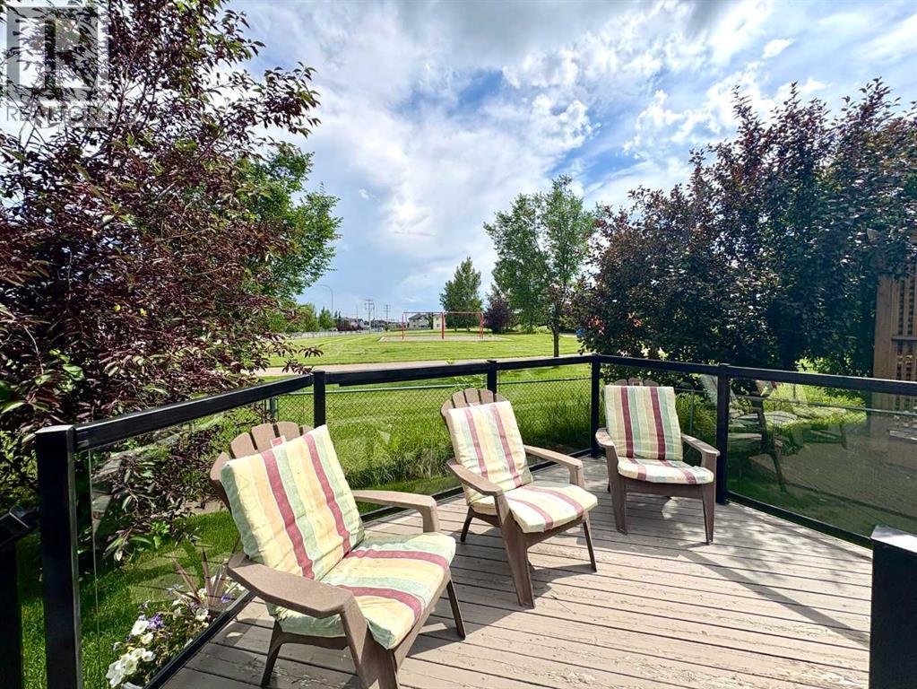 133 Channelside Cove SW, Airdrie, Alberta  T4B 2J1 - Photo 1 - A2329106