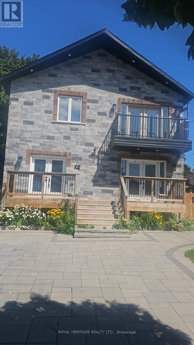 <div class="slider-price">$989,000</div><p>12 Janray Drive, Toronto, Ontario</p>