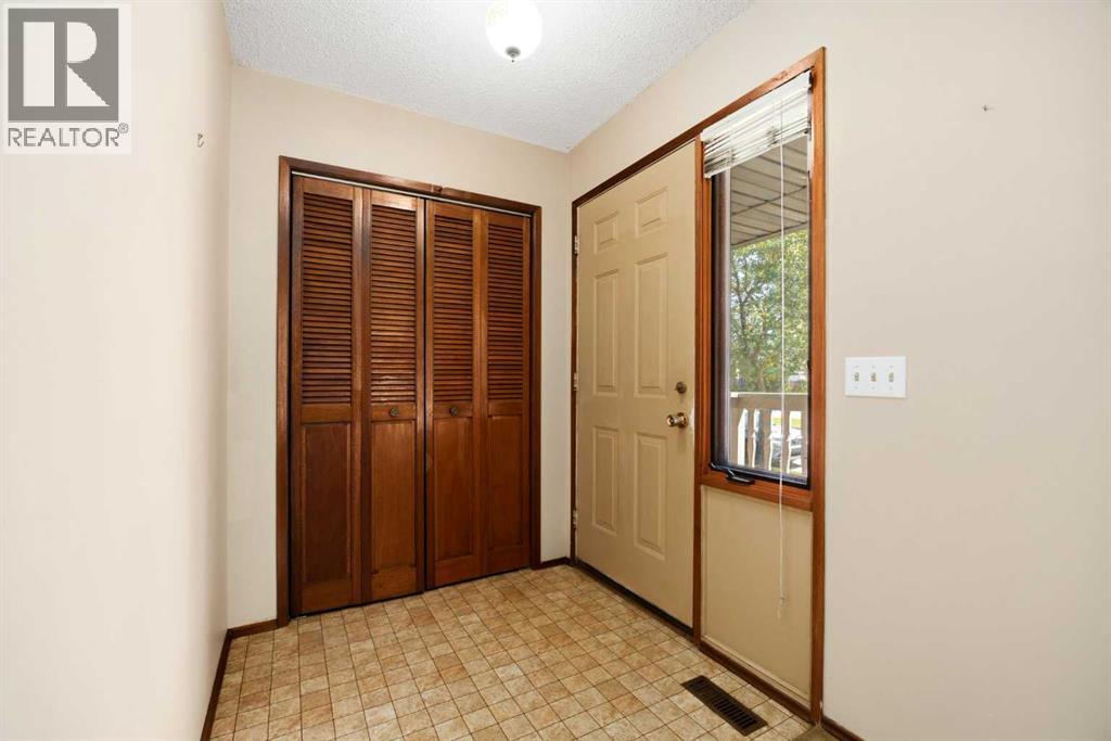 80 Macewan Drive NW, Calgary, Alberta  T3K 2P7 - Photo 5 - A2325610