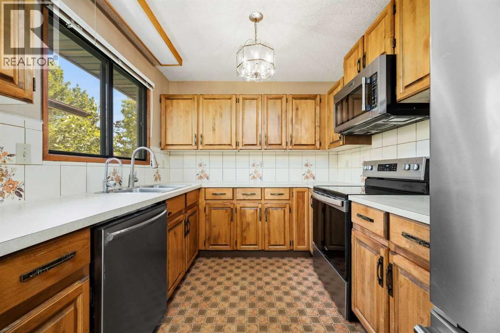 80 Macewan Drive NW, Calgary, Alberta  T3K 2P7 - Photo 14 - A2325610
