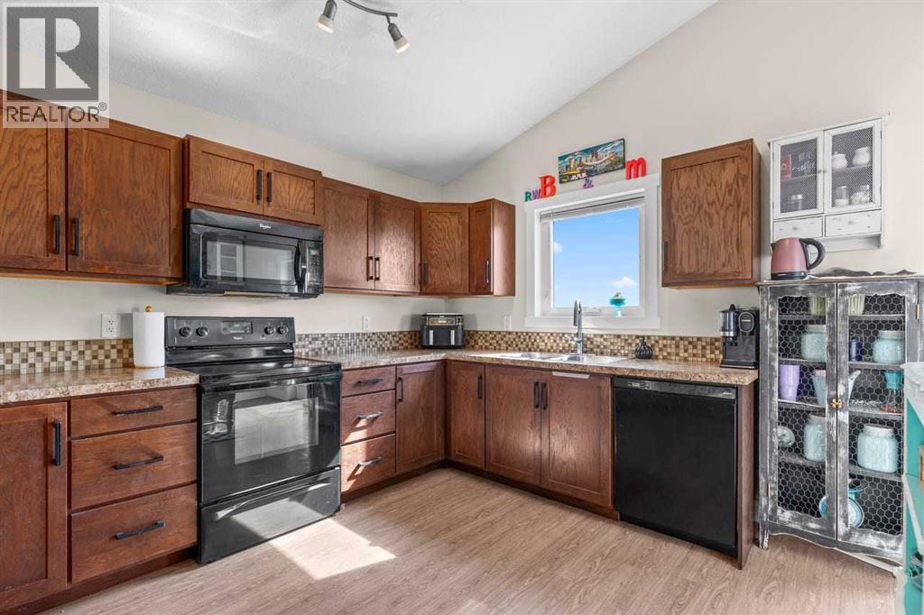 317 Mcleod Crescent, Diamond Valley, Alberta  T0L 2A0 - Photo 9 - A2329432