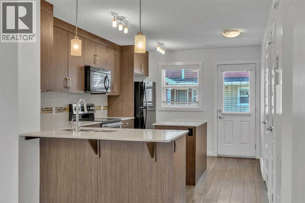 919 Auburn Bay Circle Se, Calgary, Alberta  T3M 2A3 - Photo 4 - A2326344