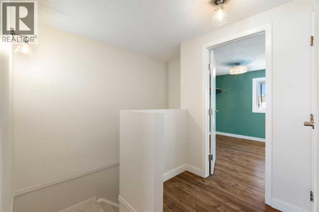 191 Woodmont Terrace Sw, Calgary, Alberta  T2W 3K3 - Photo 17 - A2321912