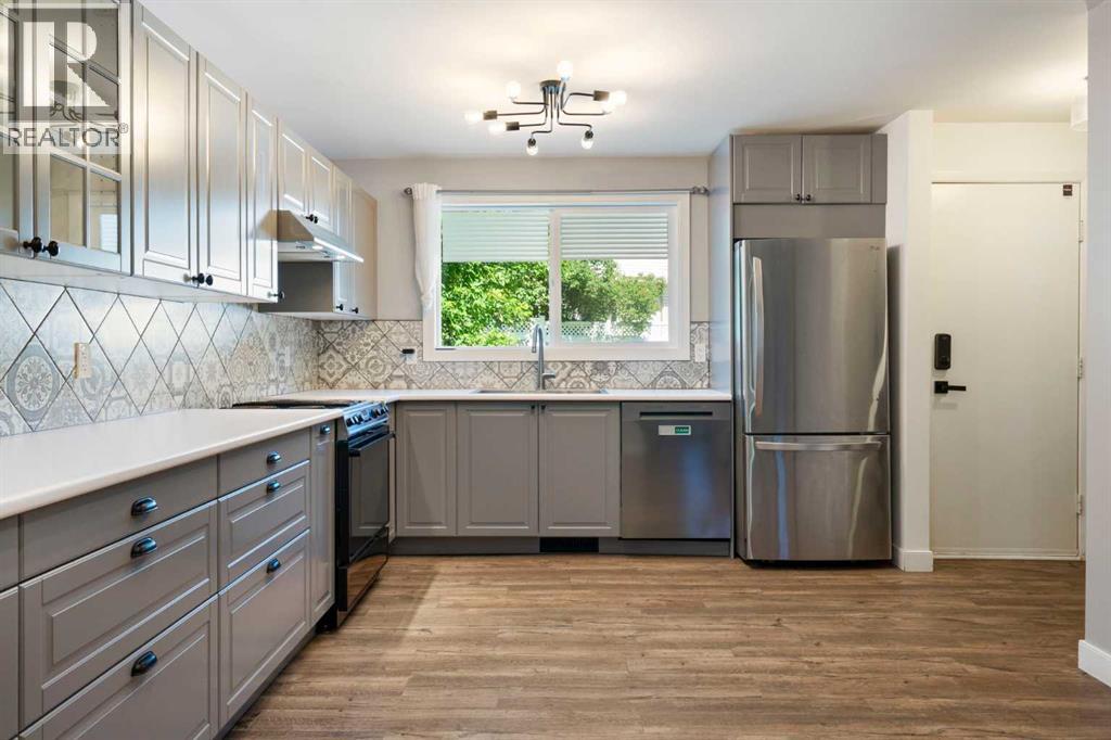 191 Woodmont Terrace Sw, Calgary, Alberta  T2W 3K3 - Photo 9 - A2321912