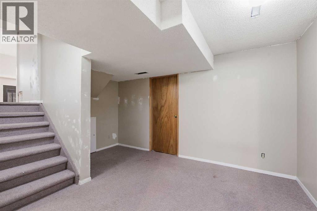 39 Woodglen Way Sw, Calgary, Alberta  T2W 4W8 - Photo 35 - A2328228