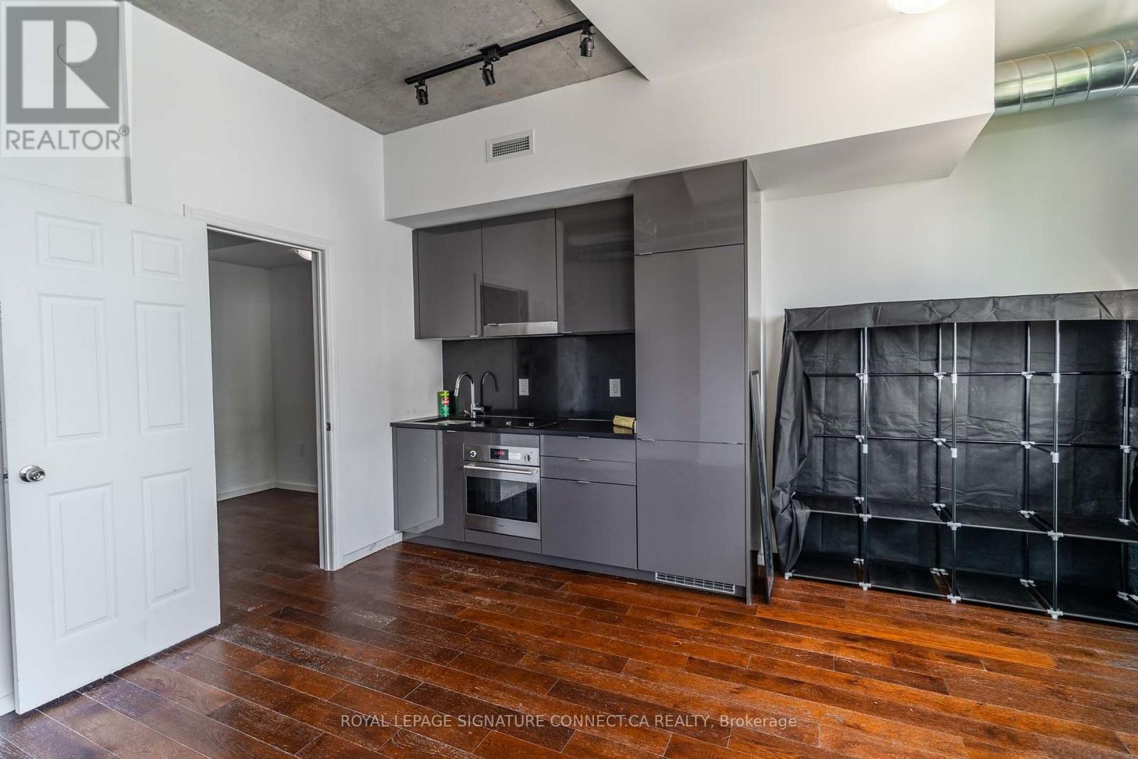 910 - 21 Lawren Harris Square, Toronto, Ontario  M5A 0T4 - Photo 2 - C13588646