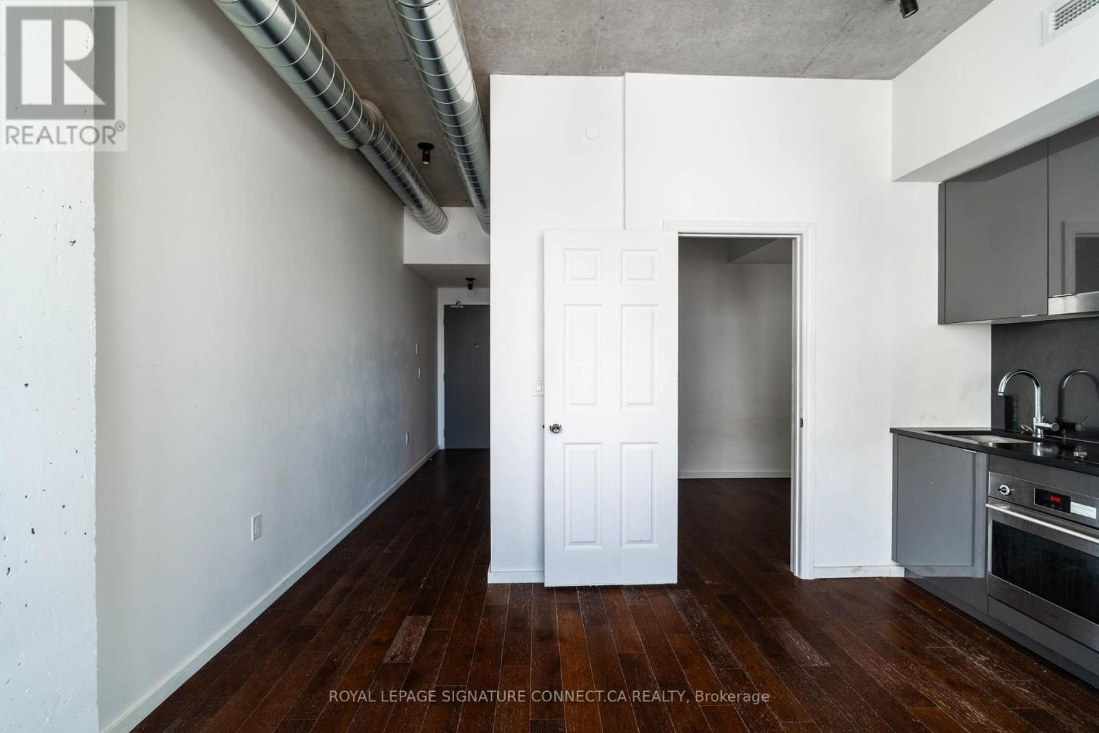 910 - 21 Lawren Harris Square, Toronto, Ontario  M5A 0T4 - Photo 5 - C13588646