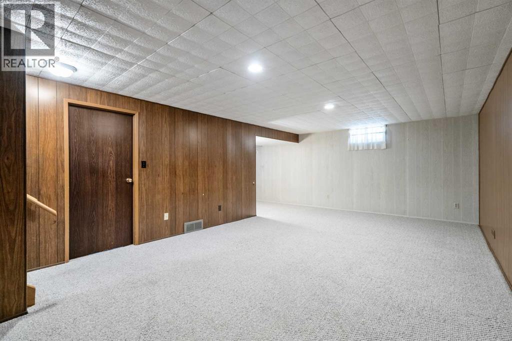 1102 Lake Christina Way Se, Calgary, Alberta  T2J 2R3 - Photo 36 - A2323564