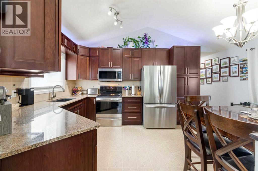 336 Coventry Close Ne, Calgary, Alberta  T3K 4C5 - Photo 7 - A2325594